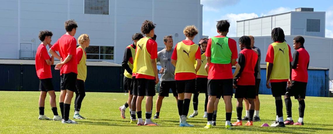 Coaches and players huddle